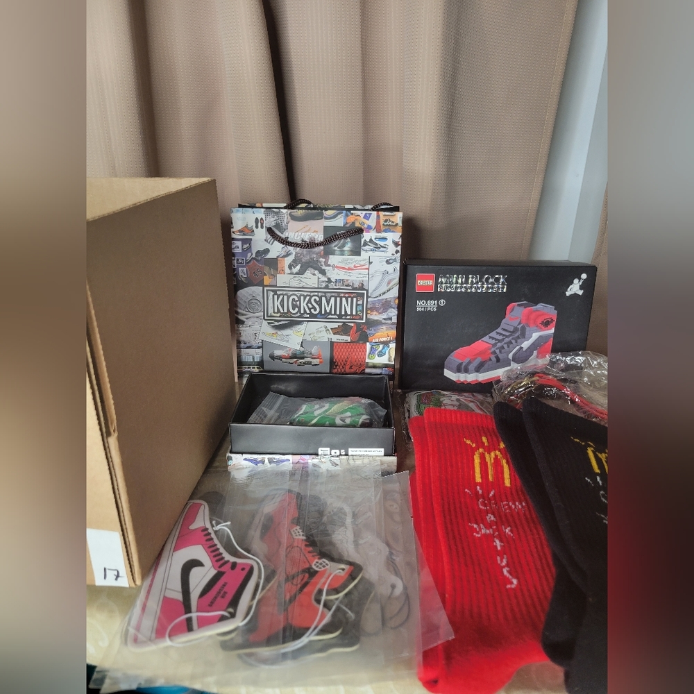 Nike Sneaker keychain bundle with 2 Catcus Jacks McDonald's socks and more.